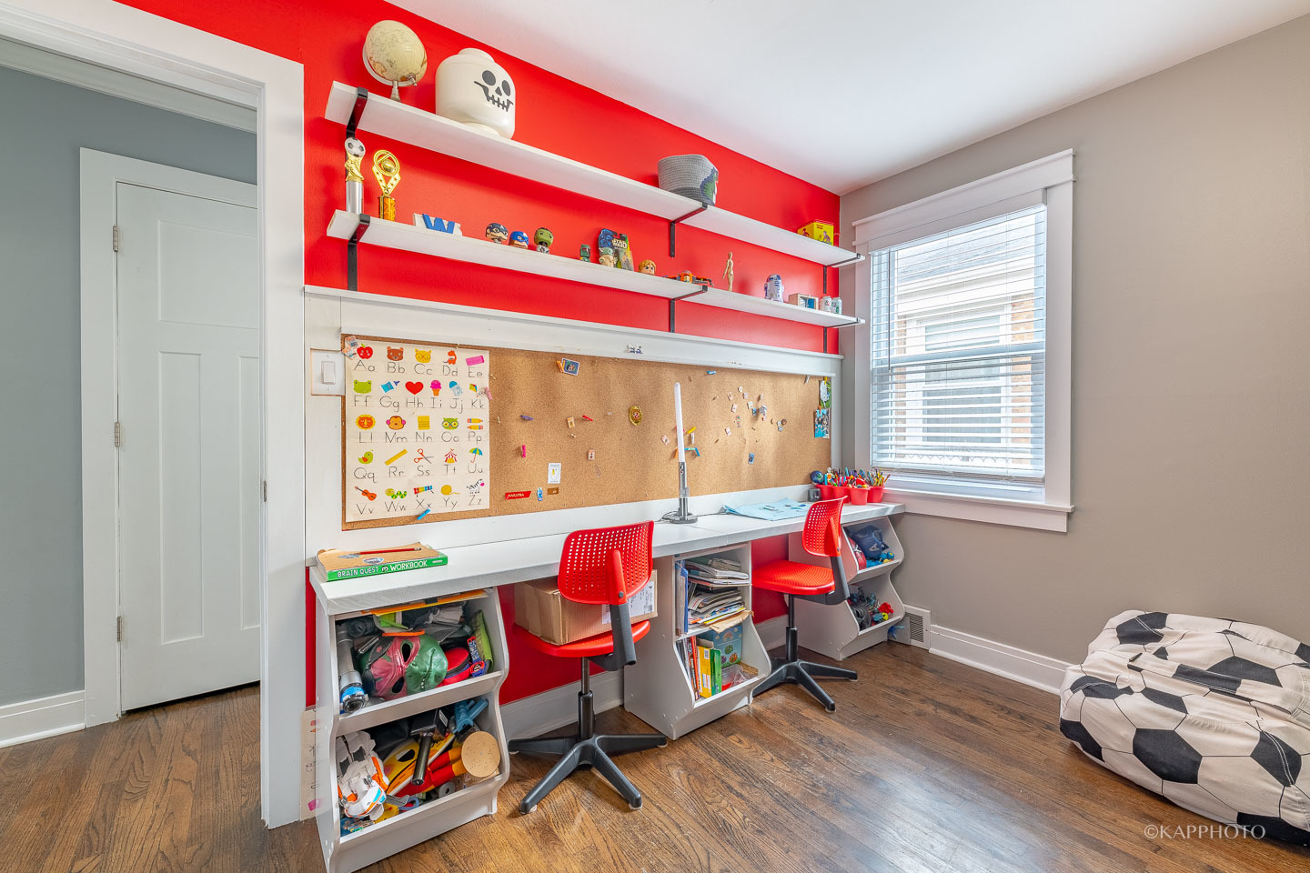 2124 Seward Street Evanston, IL 60202 - Photo 20 of 27 a living room with furniture and a wooden floor