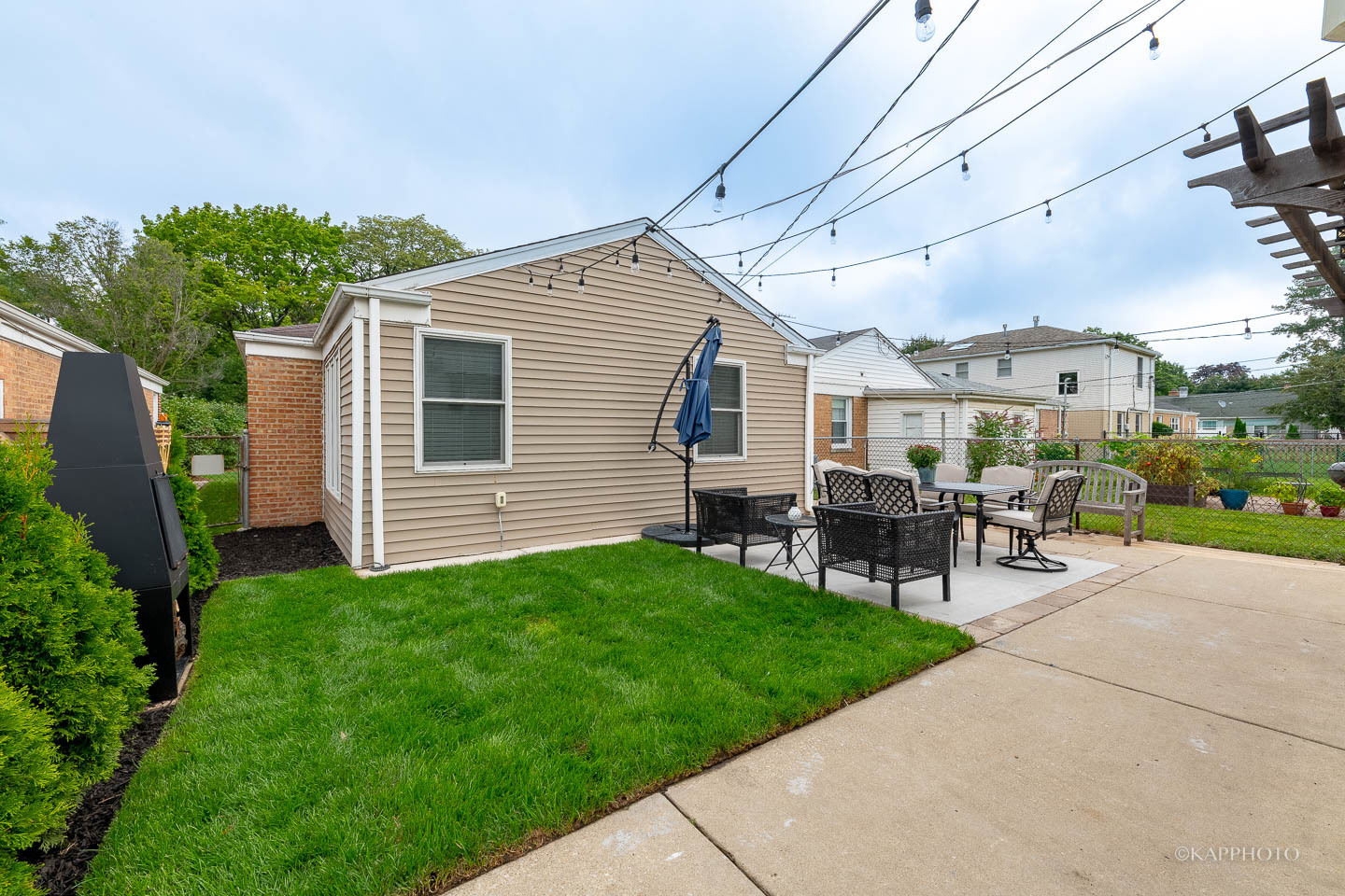 2124 Seward Street Evanston, IL 60202 - Photo 24 of 27 a view of a backyard with sitting area and slide