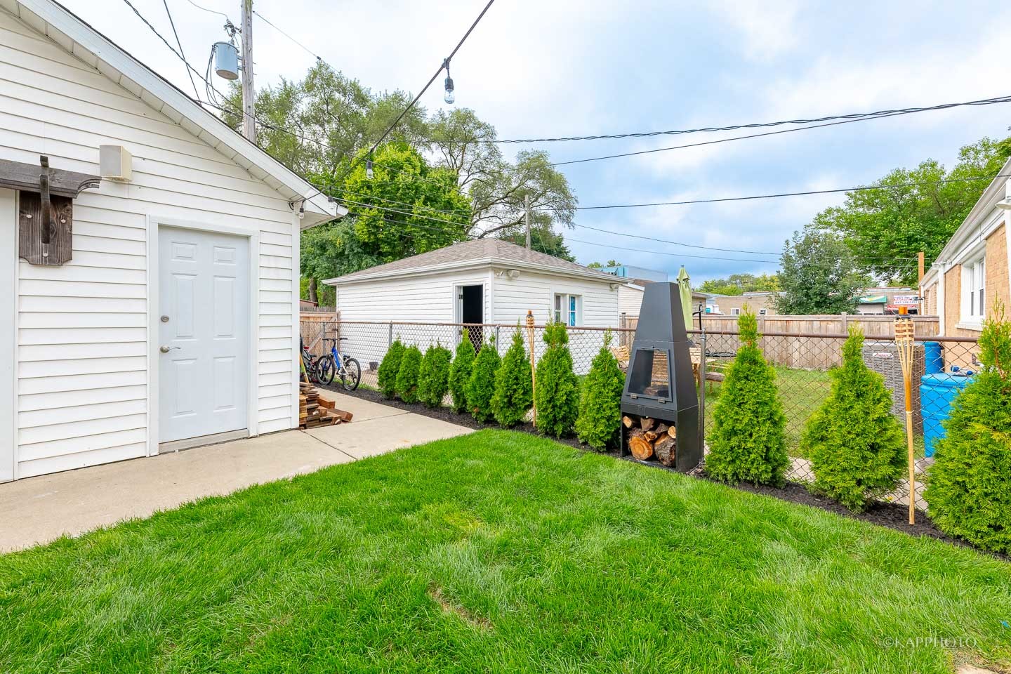 2124 Seward Street Evanston, IL 60202 - Photo 26 of 27 a view of an house with backyard and garden
