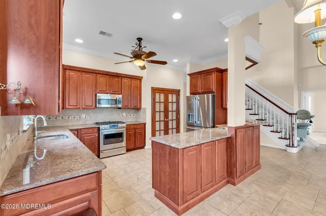 a bathroom with a tub and shower