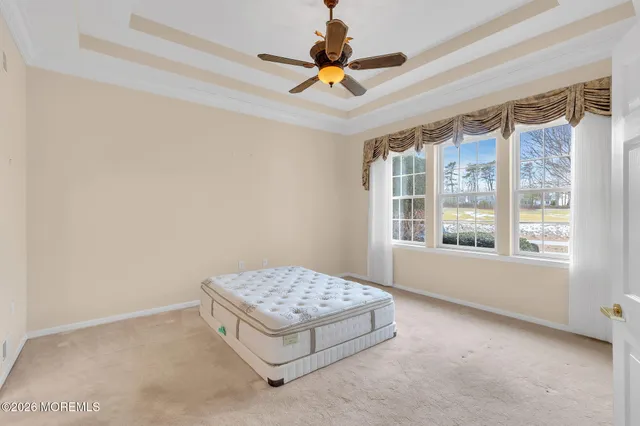 a front view of a house with a yard table and chairs