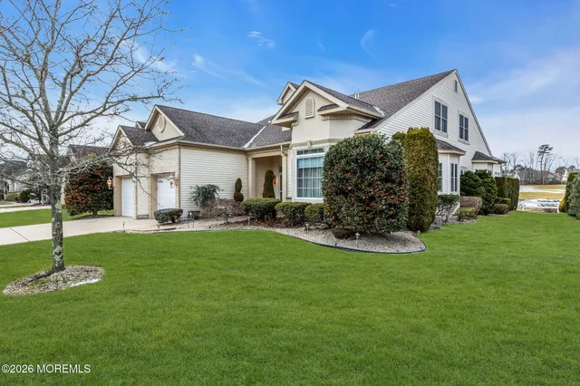 a view of a chandelier in a livingroom with a chandelier