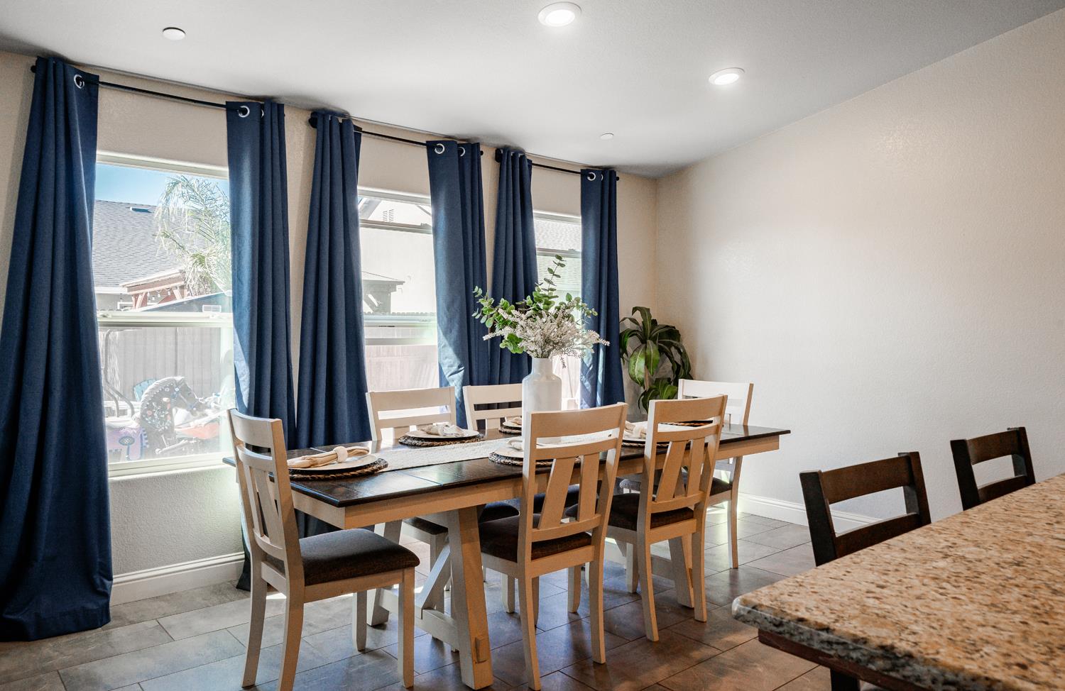 3133 4th Street Sanger, CA 93657 - Photo 17 of 33 a view of a dining room with furniture and window