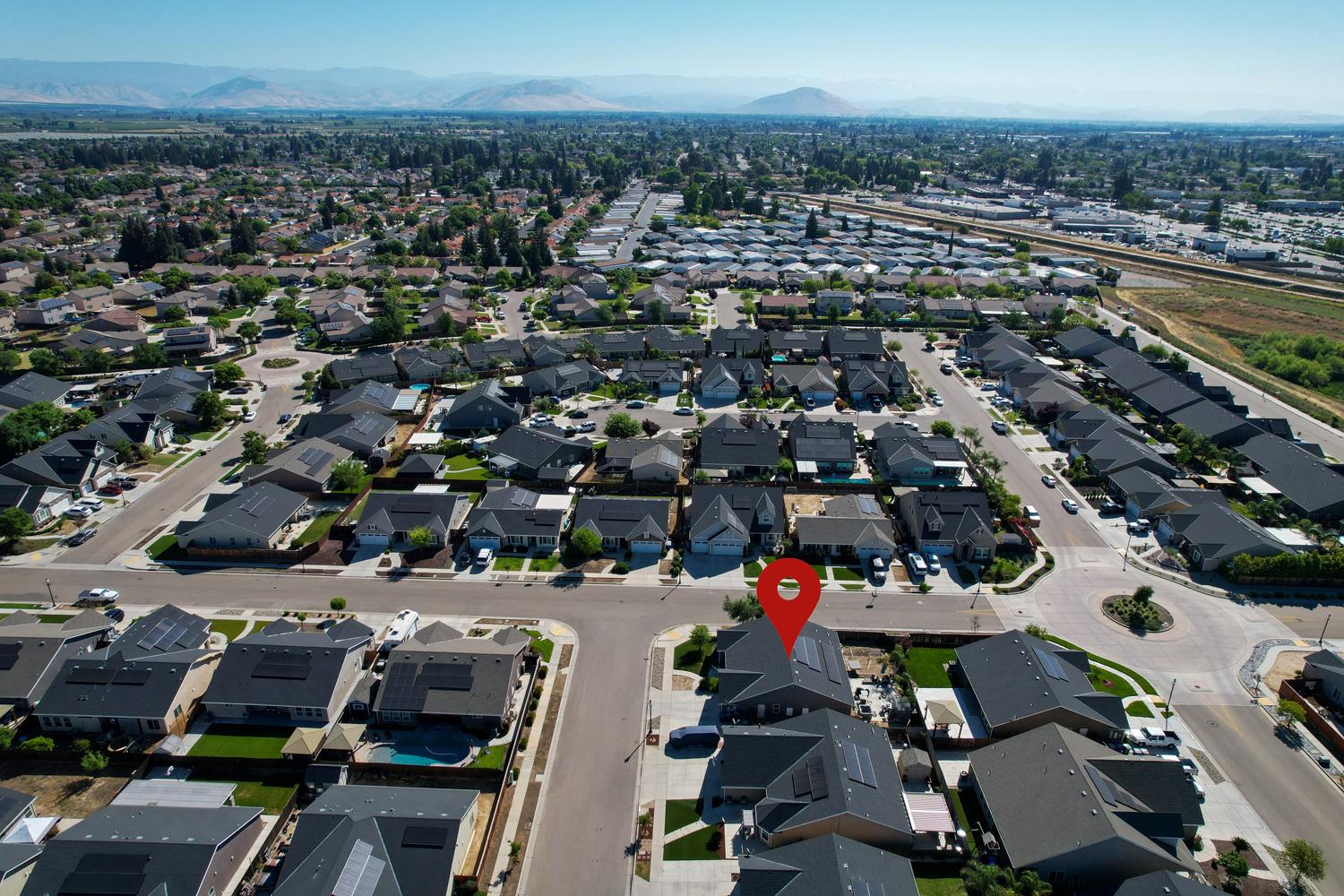 3133 4th Street Sanger, CA 93657 - Photo 27 of 33 an aerial view of a city