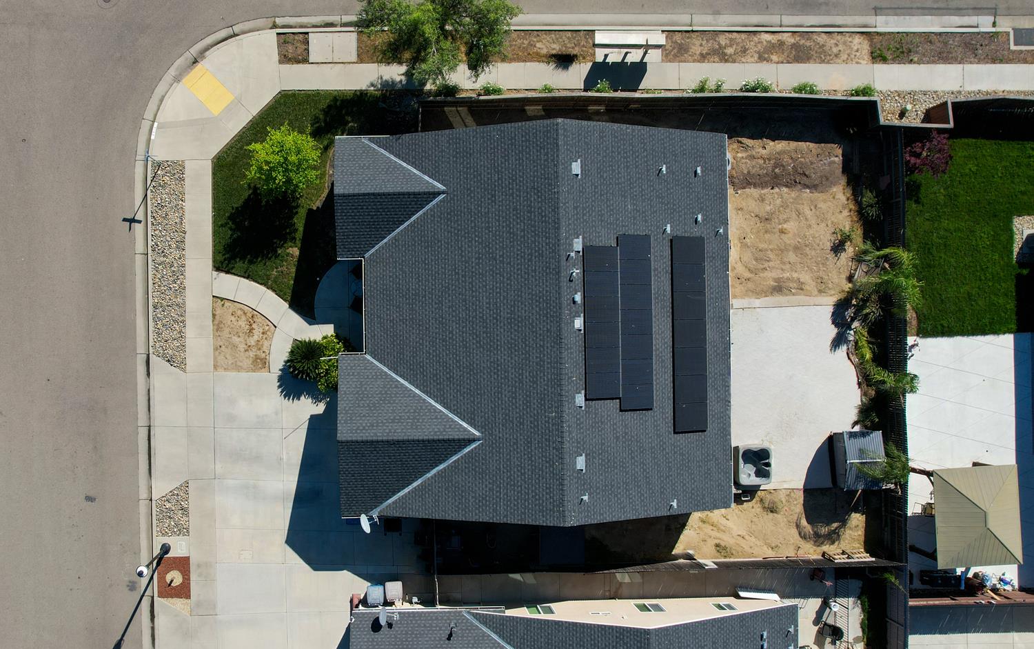 3133 4th Street Sanger, CA 93657 - Photo 29 of 33 an aerial view of a house with a yard wooden table and chairs