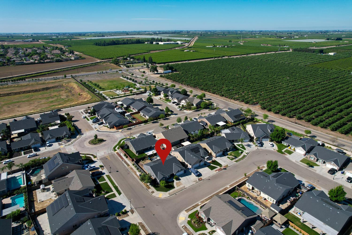 3133 4th Street Sanger, CA 93657 - Photo 33 of 33 an aerial view of a house with a garden