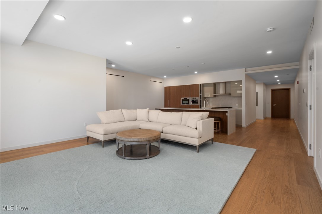 22700 Lake Road, Unit 204 Rocky River, OH 44116 - Photo 5 of 31 Living room with recessed lighting and light wood-type flooring