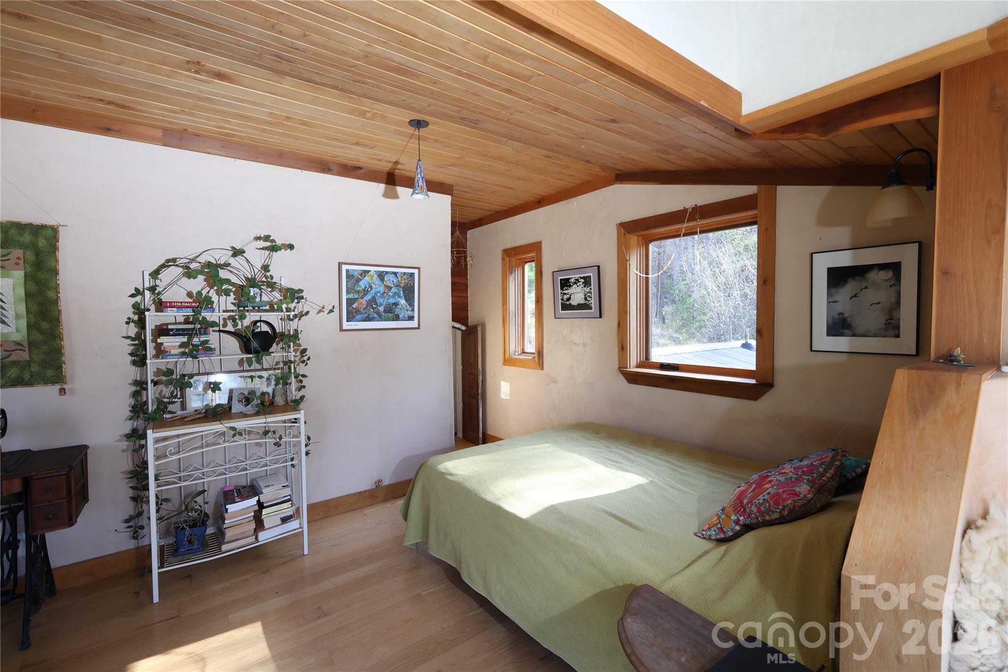 1422 Middle Fork Road Hendersonville, NC 28792 - Photo 24 of 48 a bedroom with a bed and a window