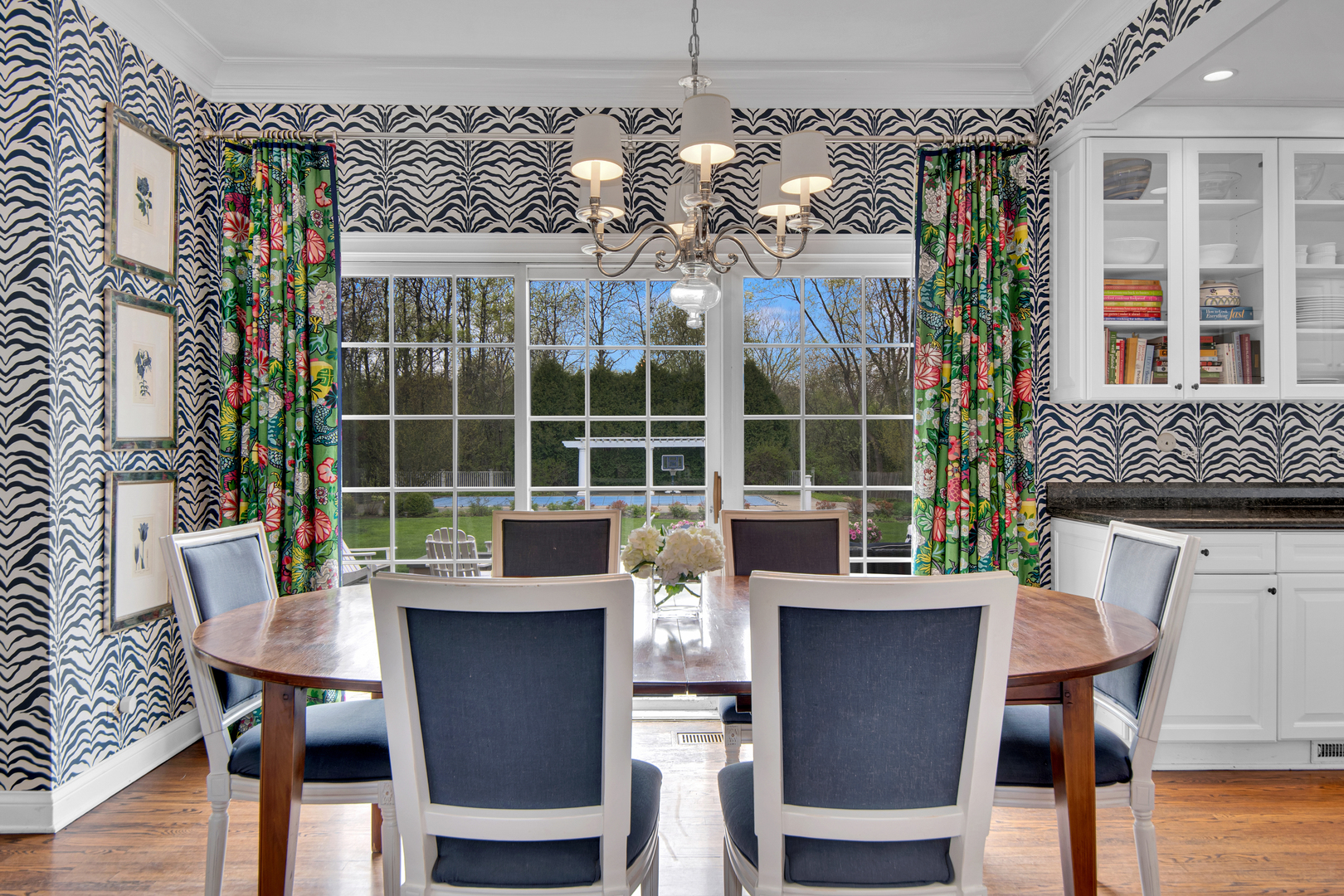 500 Douglas Drive Lake Forest, IL 60045 - Photo 13 of 34 a view of a dining room with furniture window and wooden floor