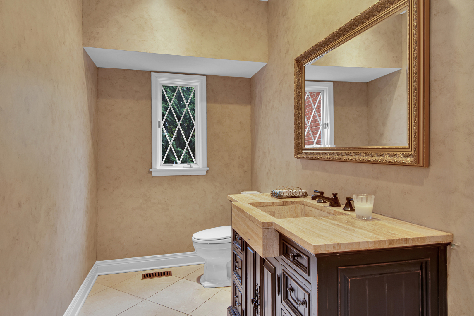 500 Douglas Drive Lake Forest, IL 60045 - Photo 17 of 34 a bathroom with a sink a toilet and mirror