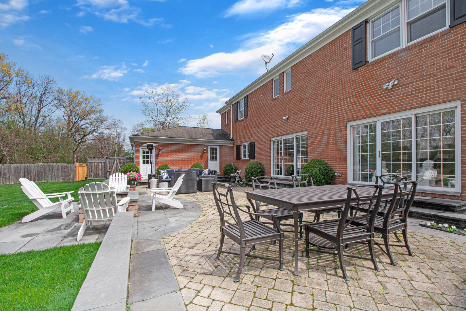 500 Douglas Drive Lake Forest, IL 60045 - Photo 31 of 34 a view of a patio with table and chairs and potted plants