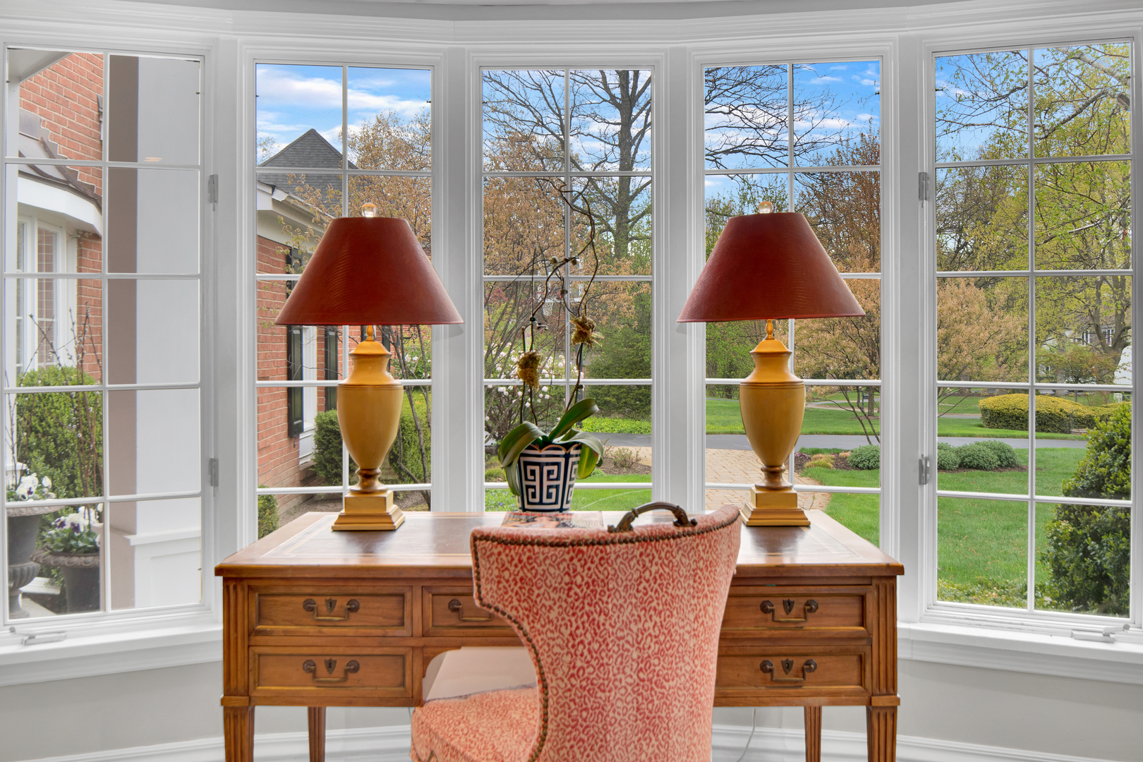 500 Douglas Drive Lake Forest, IL 60045 - Photo 8 of 34 a table and chair sitting in front of a window