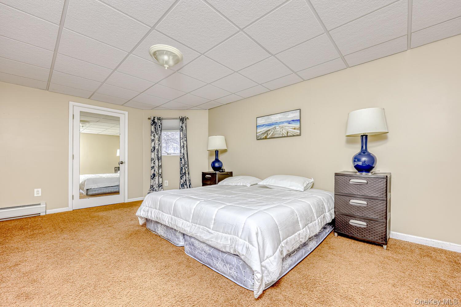 22 Golden Road Suffern, NY 10901 - Photo 34 of 41 Carpeted bedroom with a drop ceiling