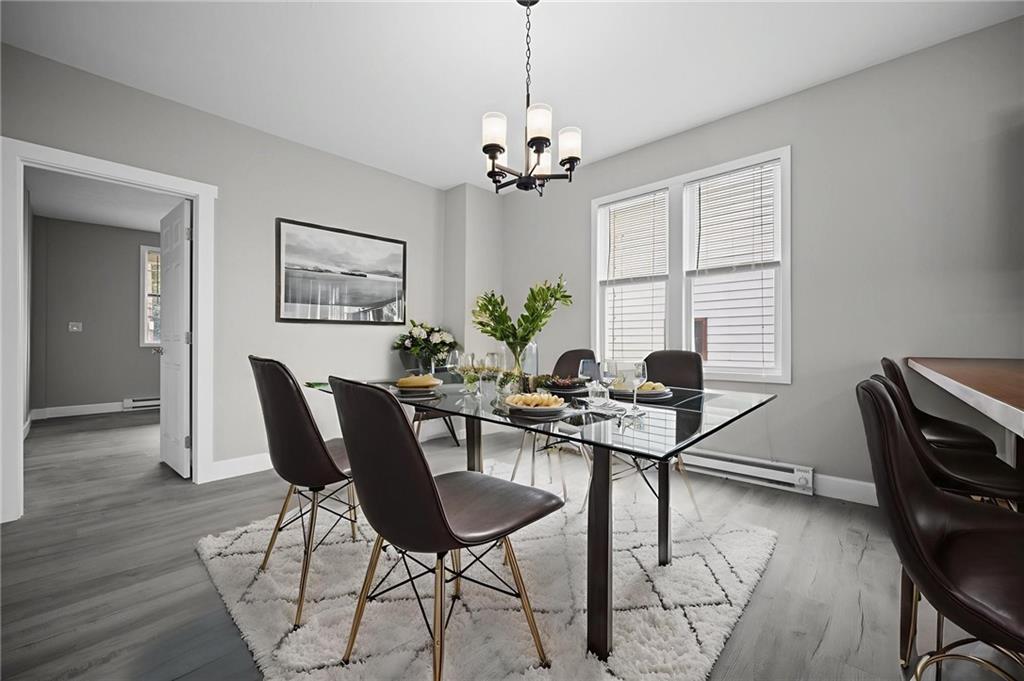 423 2nd Street Donora, PA 15033 - Photo 12 of 47 a view of a dining room with furniture and a chandelier