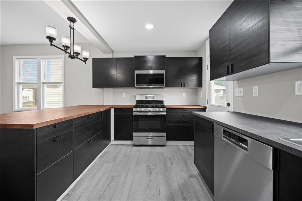 423 2nd Street Donora, PA 15033 - Photo 15 of 47 a kitchen with a sink and steel appliances