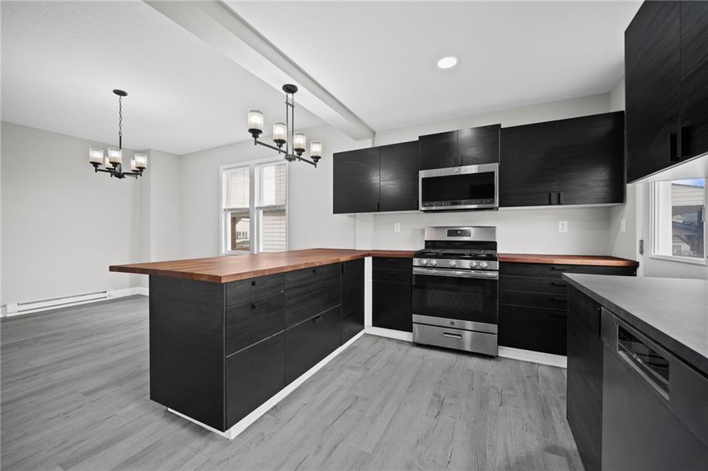 423 2nd Street Donora, PA 15033 - Photo 16 of 47 a kitchen with a sink and stainless steel appliances