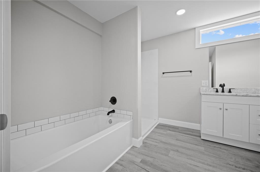 423 2nd Street Donora, PA 15033 - Photo 33 of 47 a bathroom with a tub sink and mirror