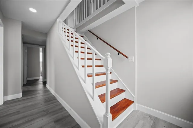 a view of entryway with wooden floor