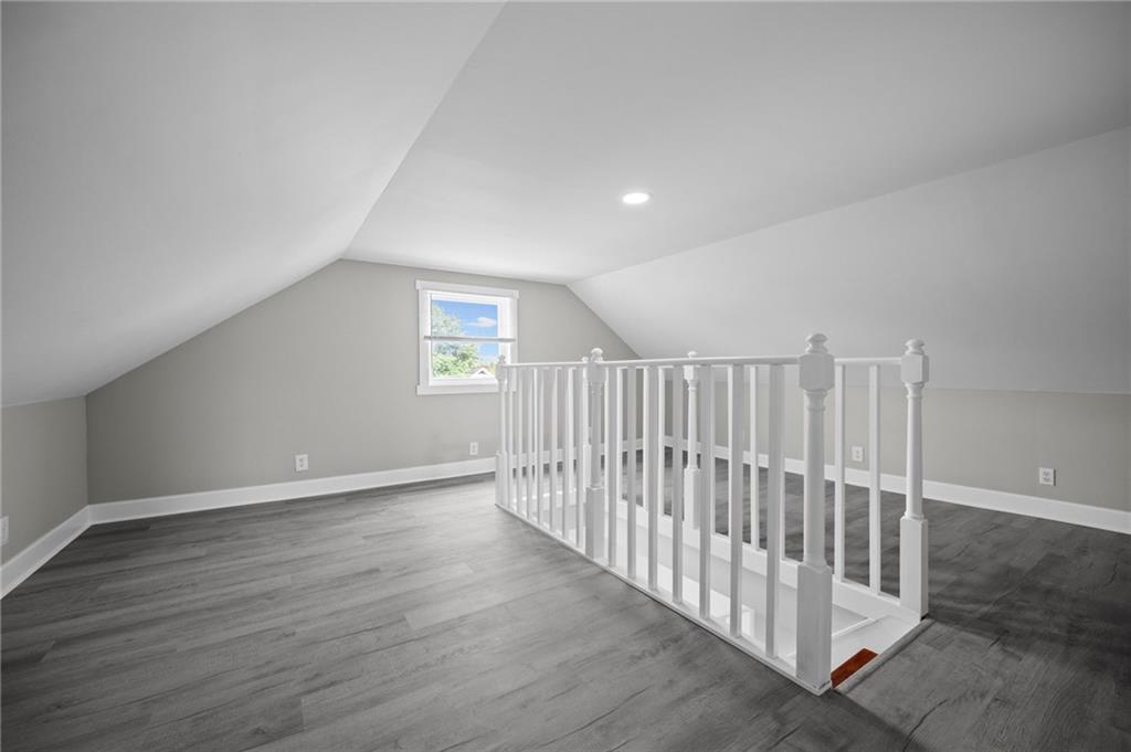 423 2nd Street Donora, PA 15033 - Photo 37 of 47 an empty room with wooden floor & windows