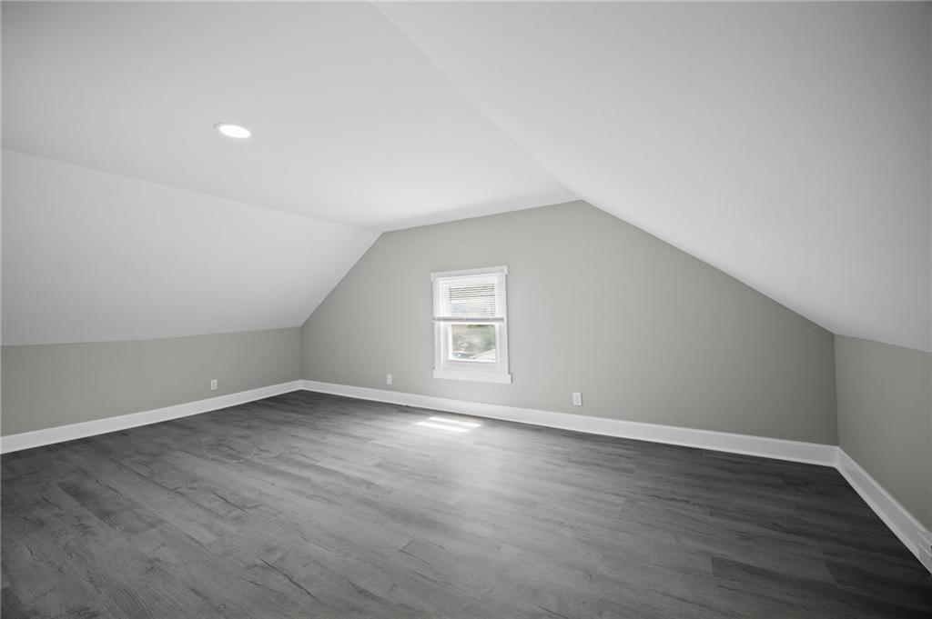 423 2nd Street Donora, PA 15033 - Photo 41 of 47 a view of an empty room with wooden floor and a window
