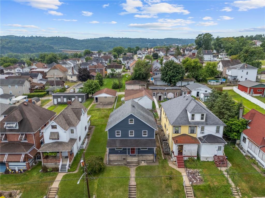 423 2nd Street Donora, PA 15033 - Photo 46 of 47 an aerial view of a house with a garden and lake view