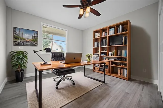 a workspace with wooden floor and a workspace
