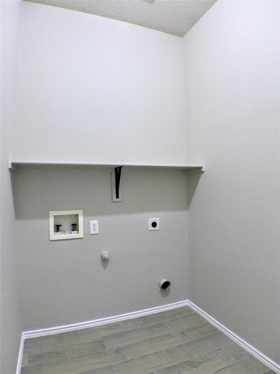 7300 Cresswell Drive Arlington, TX 76001 - Photo 17 of 20 an empty room with a wooden floor