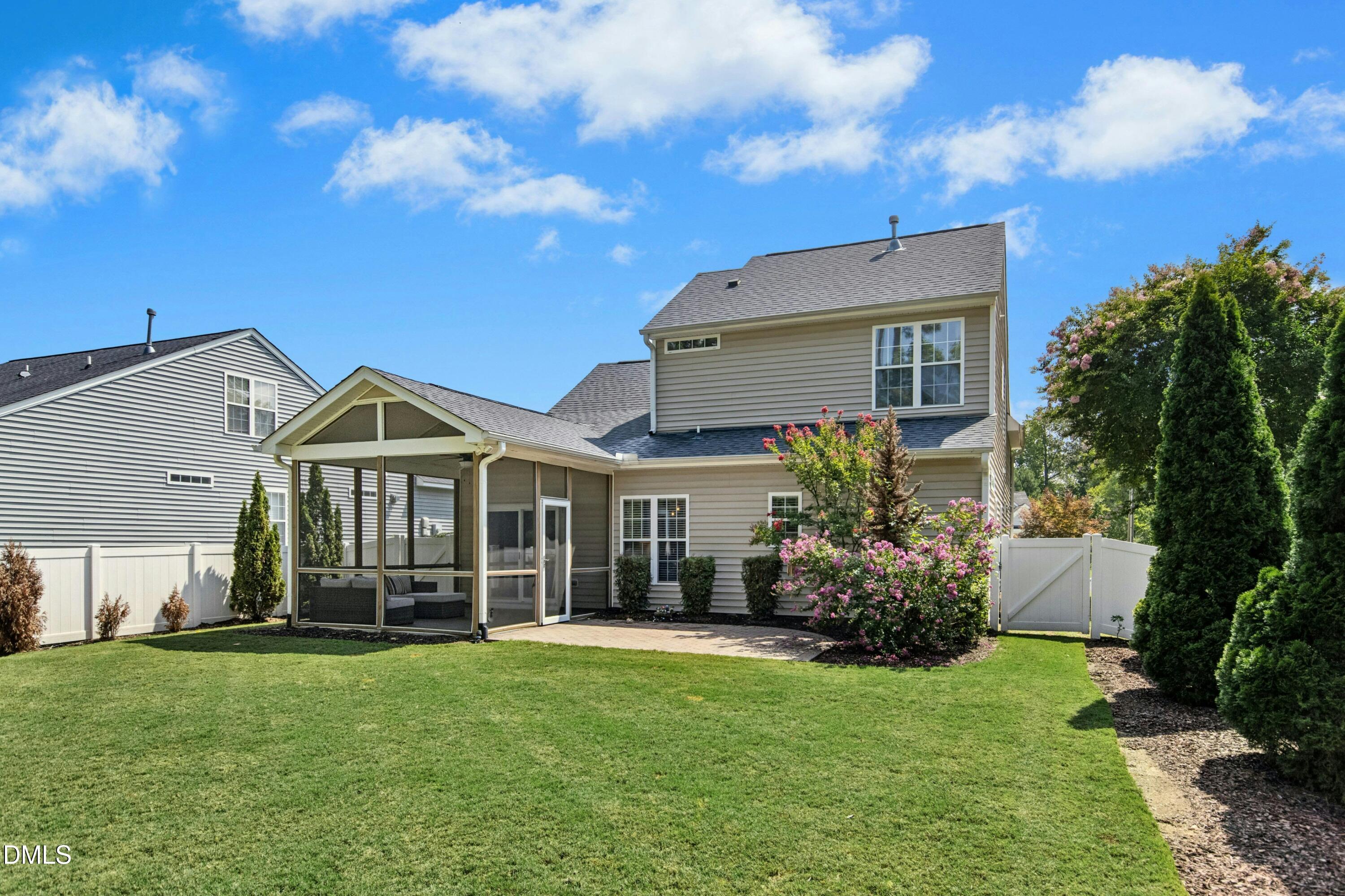 828 Nightshade Way Raleigh, NC 27610 - Photo 19 of 24 a front view of a house with a garden
