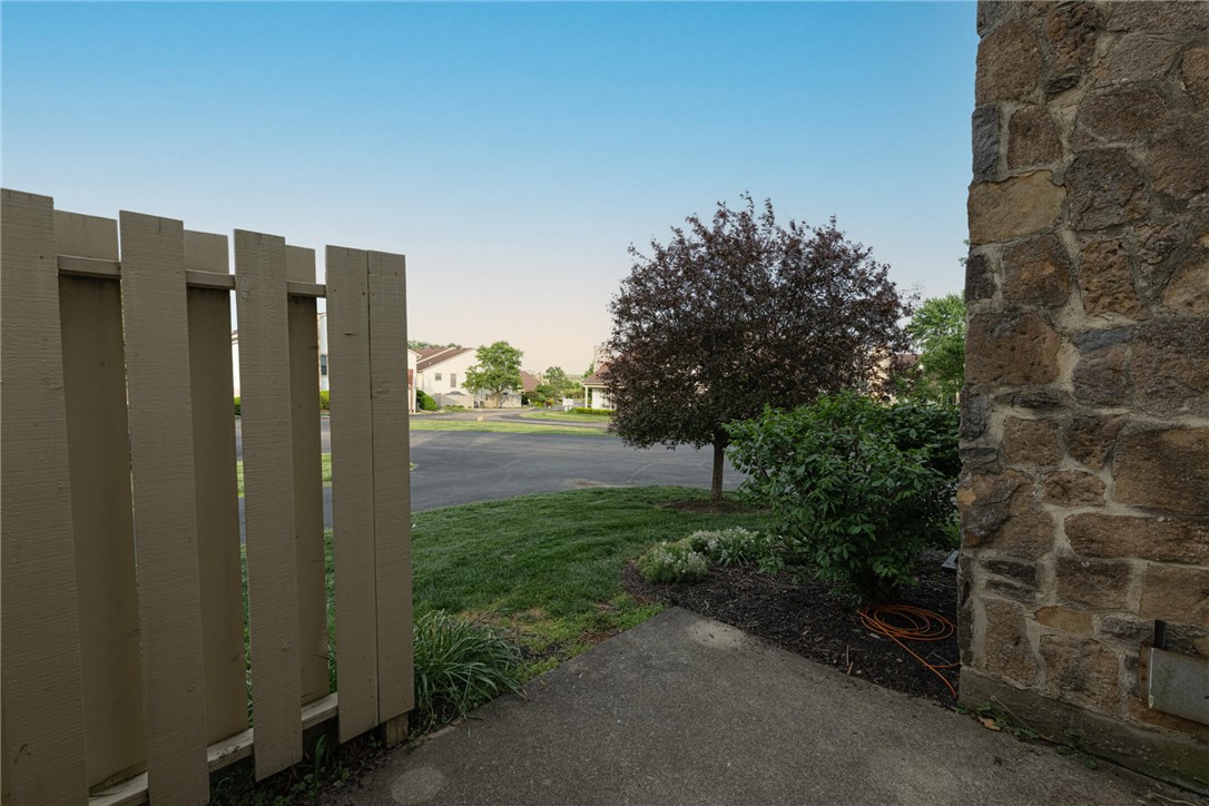 5399 Country Ridge Drive Mason, OH 45040 - Photo 25 of 29 This inviting exterior showcases a charming stone facade and lush landscaping.