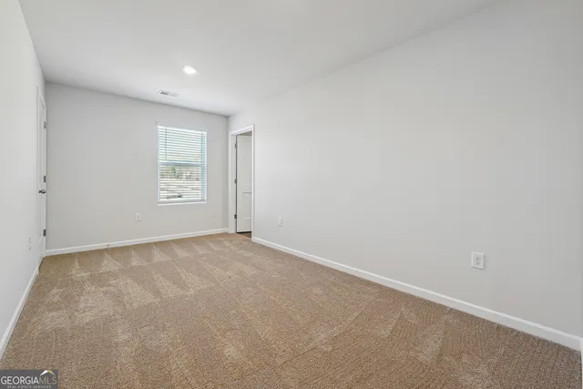 an empty room with a window