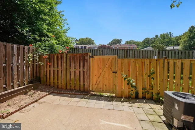 a view of wooden fence with wooden fence