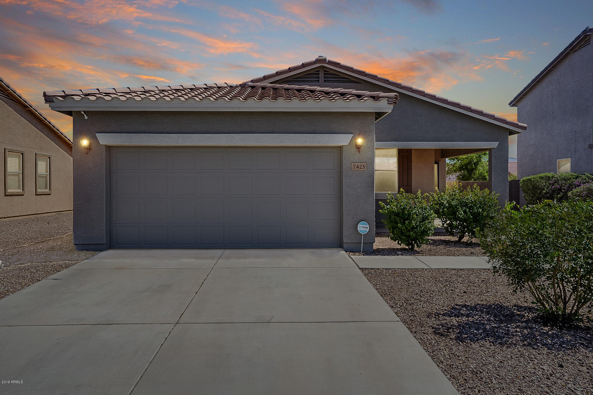 7425 West Darrel Road Laveen, AZ 85339 - Photo 1 of 64 a view of entryway with a yard