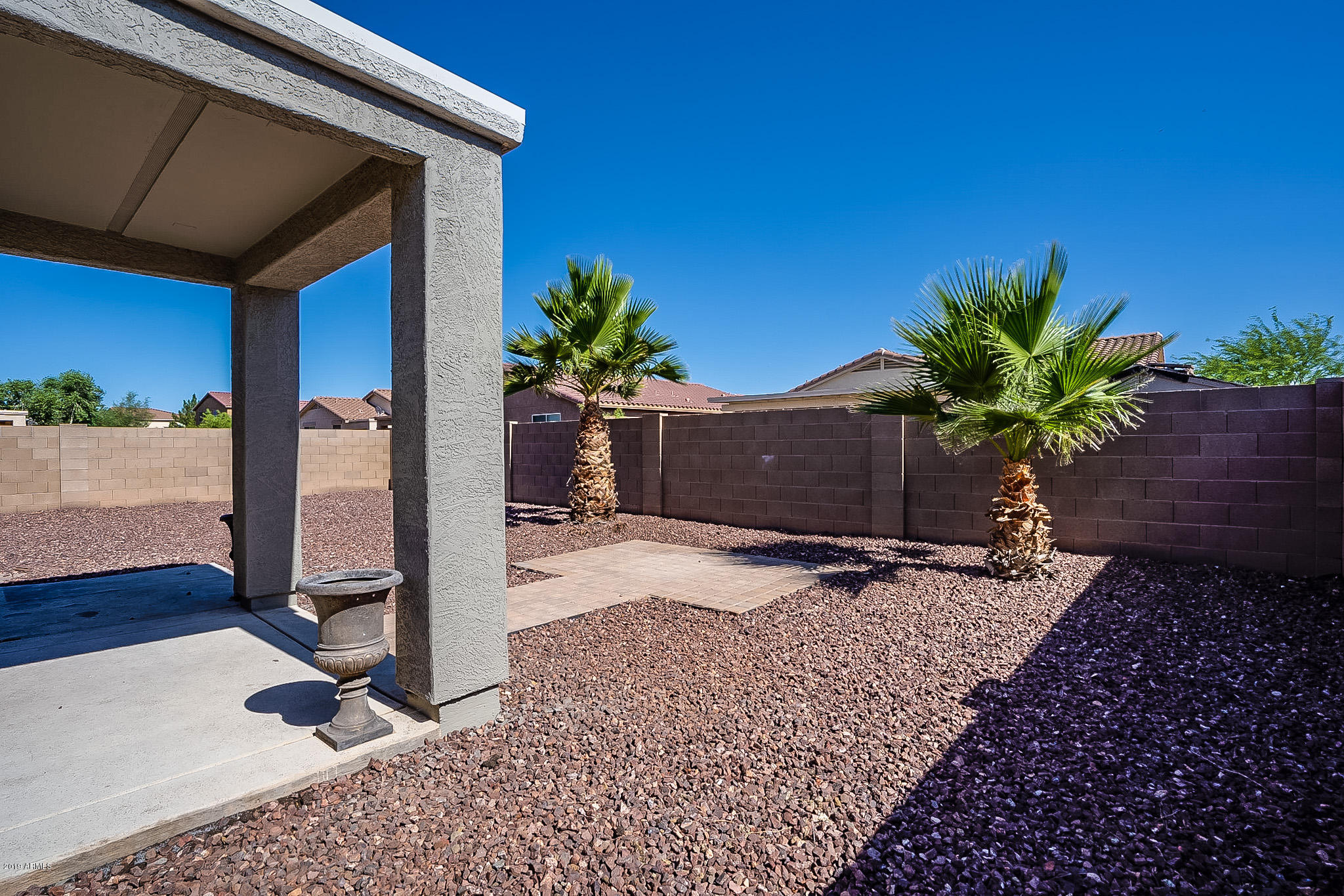 7425 West Darrel Road Laveen, AZ 85339 - Photo 4 of 64 a view of a potted plants in front of a house