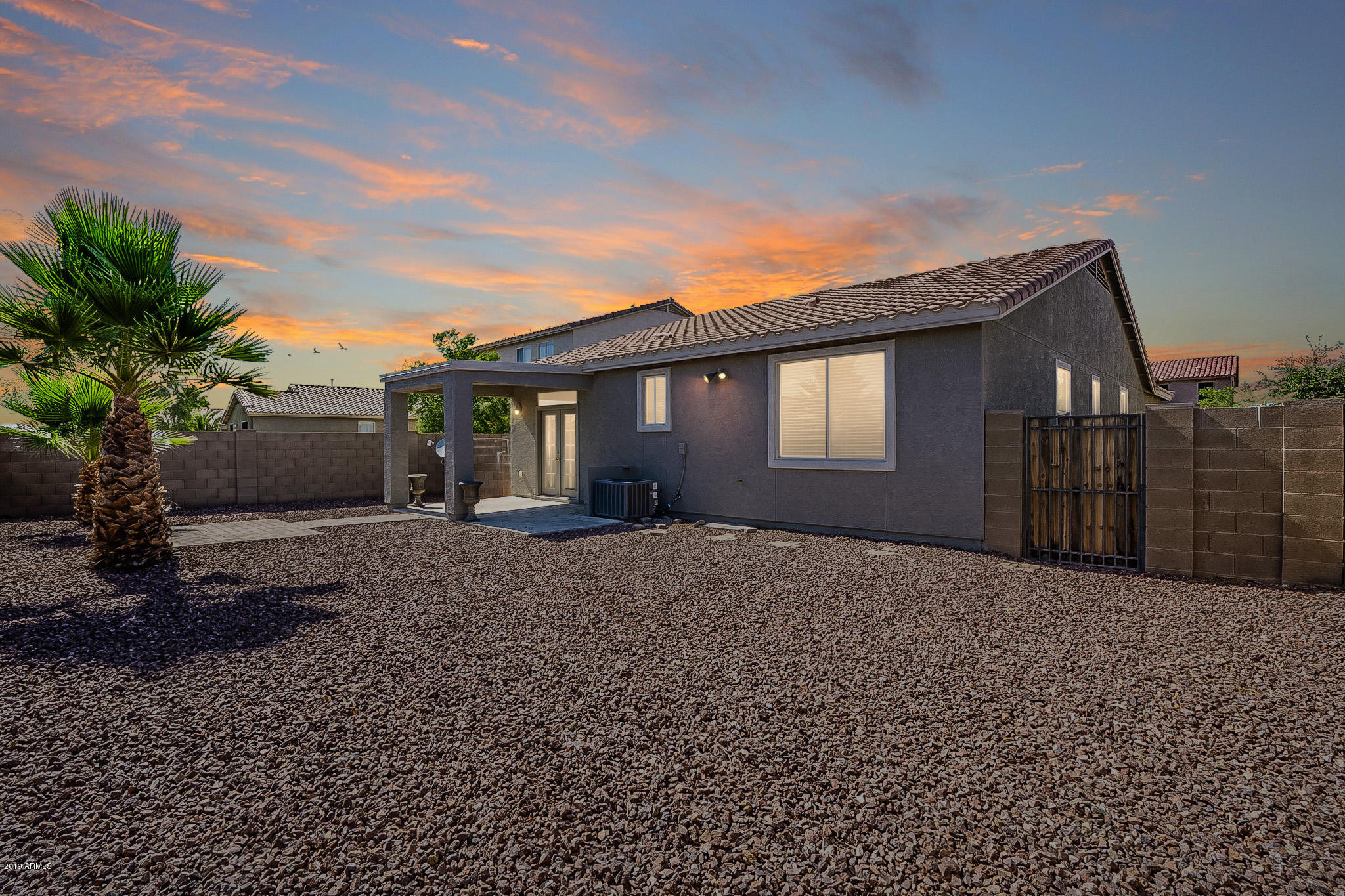 7425 West Darrel Road Laveen, AZ 85339 - Photo 61 of 64 a view of a house with a garden