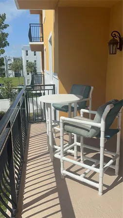 a view of a backyard with potted plants