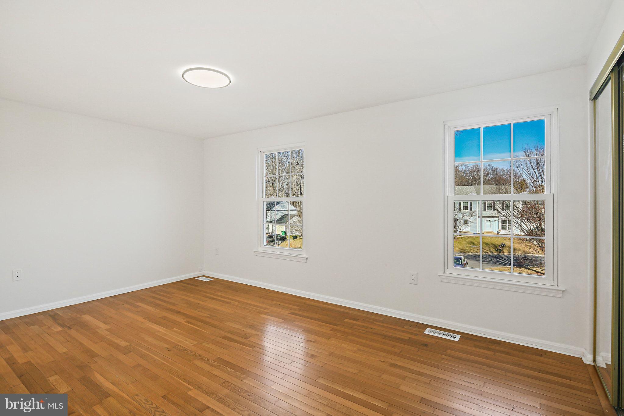 7510 Filbert Terrace Gaithersburg, MD 20879 - Photo 19 of 40 an empty room with windows