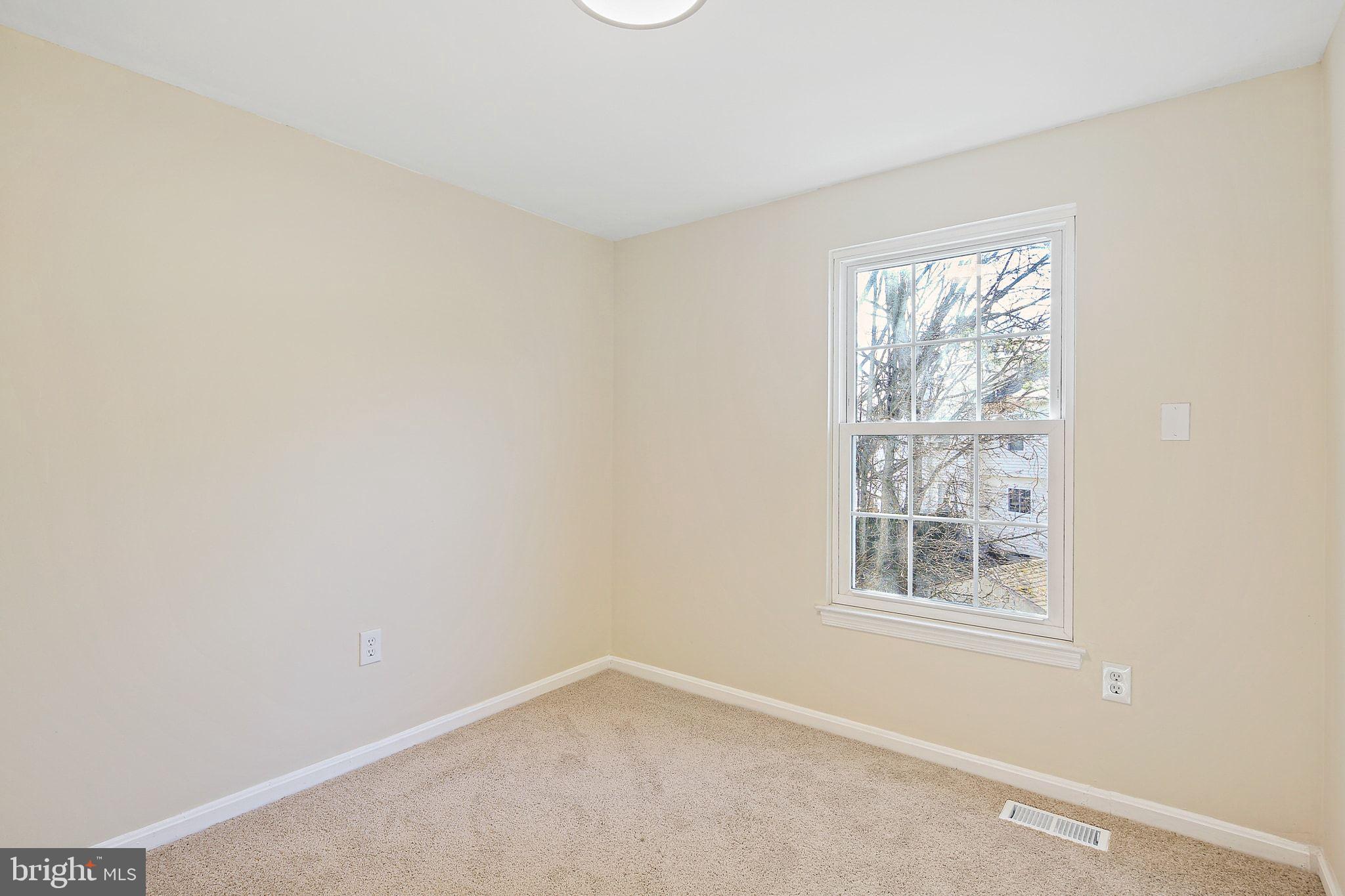 7510 Filbert Terrace Gaithersburg, MD 20879 - Photo 25 of 40 an empty room with windows
