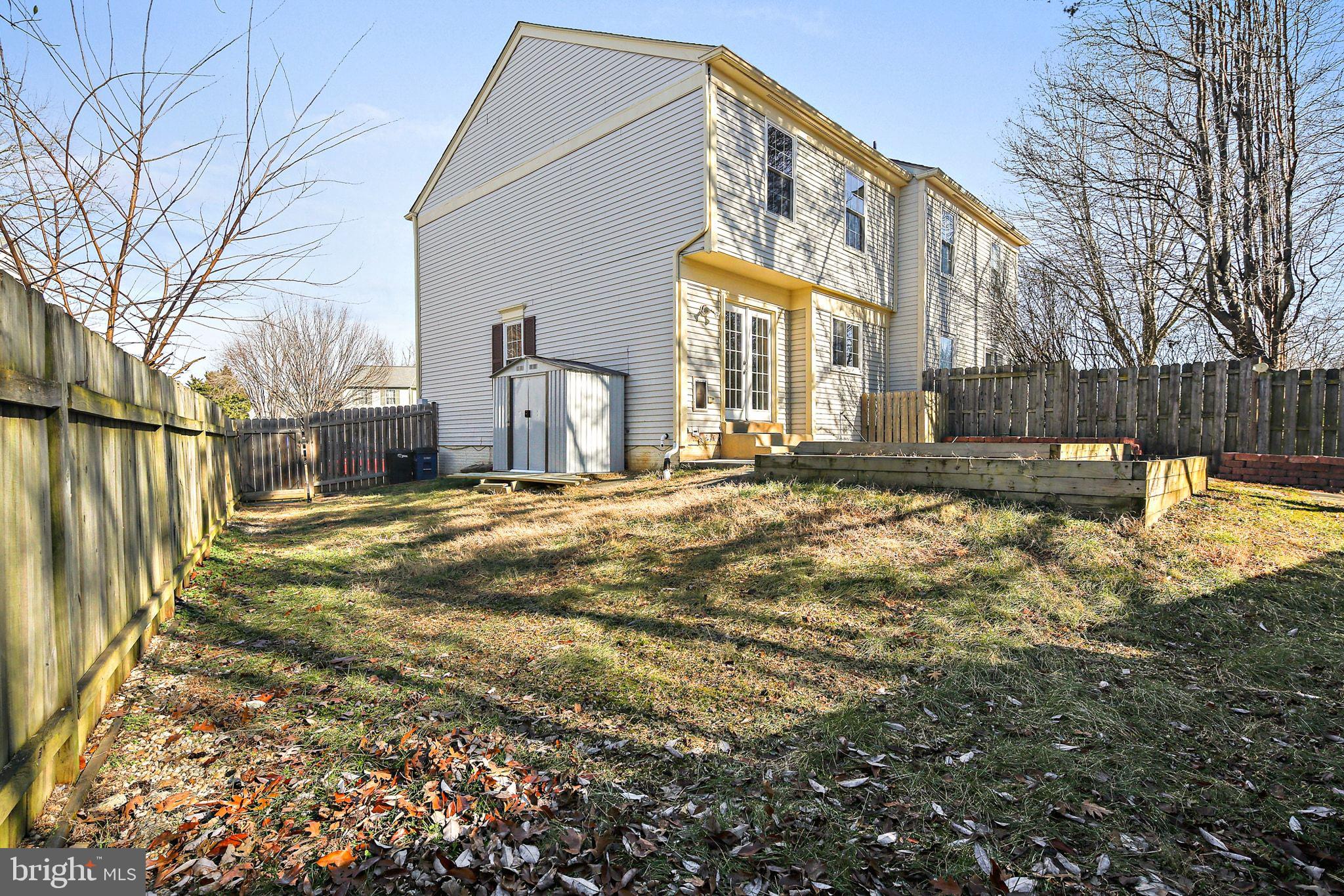 7510 Filbert Terrace Gaithersburg, MD 20879 - Photo 3 of 40 a view of a house with a yard