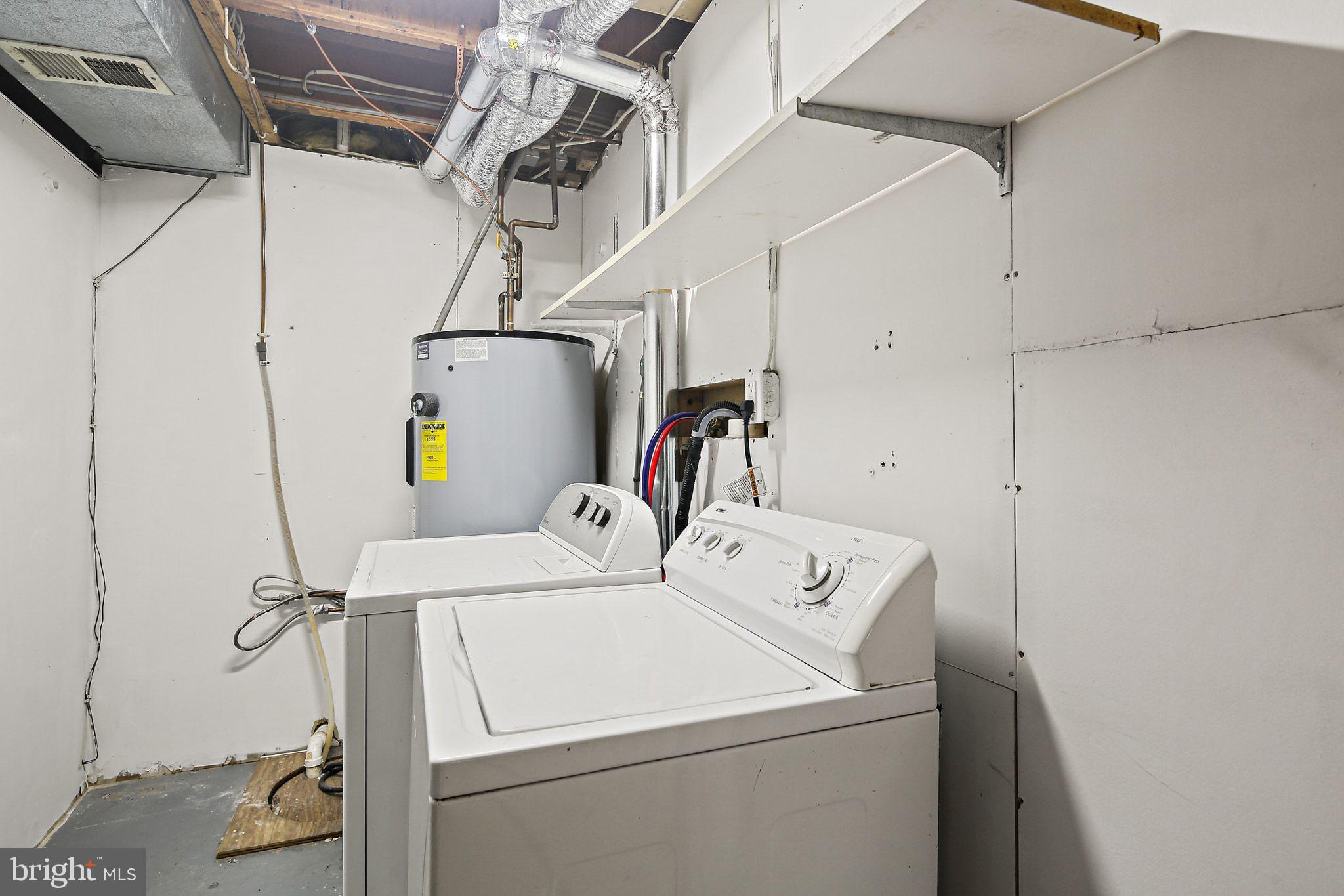 7510 Filbert Terrace Gaithersburg, MD 20879 - Photo 32 of 40 a utility room with dryer and washer