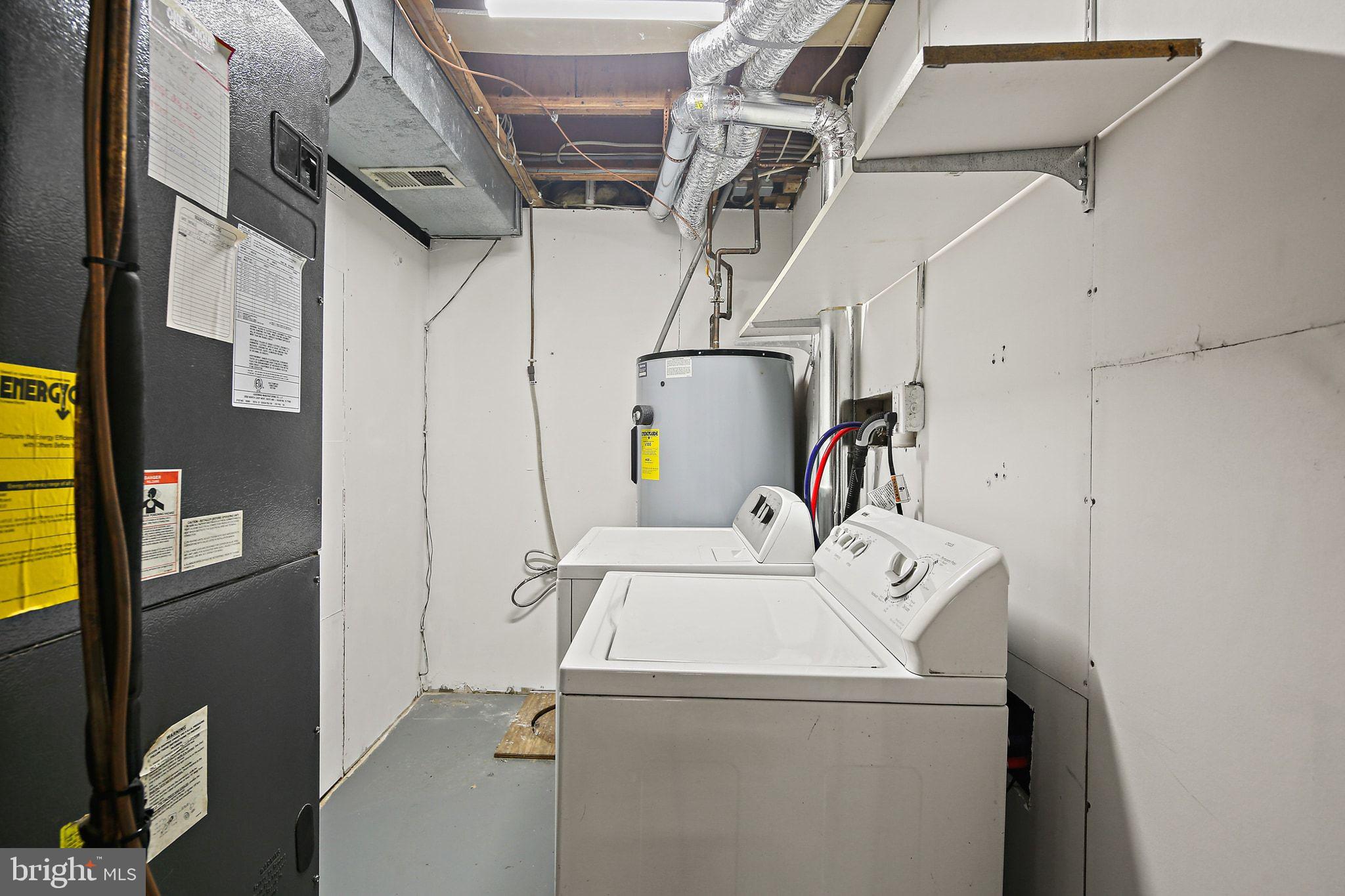 7510 Filbert Terrace Gaithersburg, MD 20879 - Photo 33 of 40 a utility room with dryer and washer