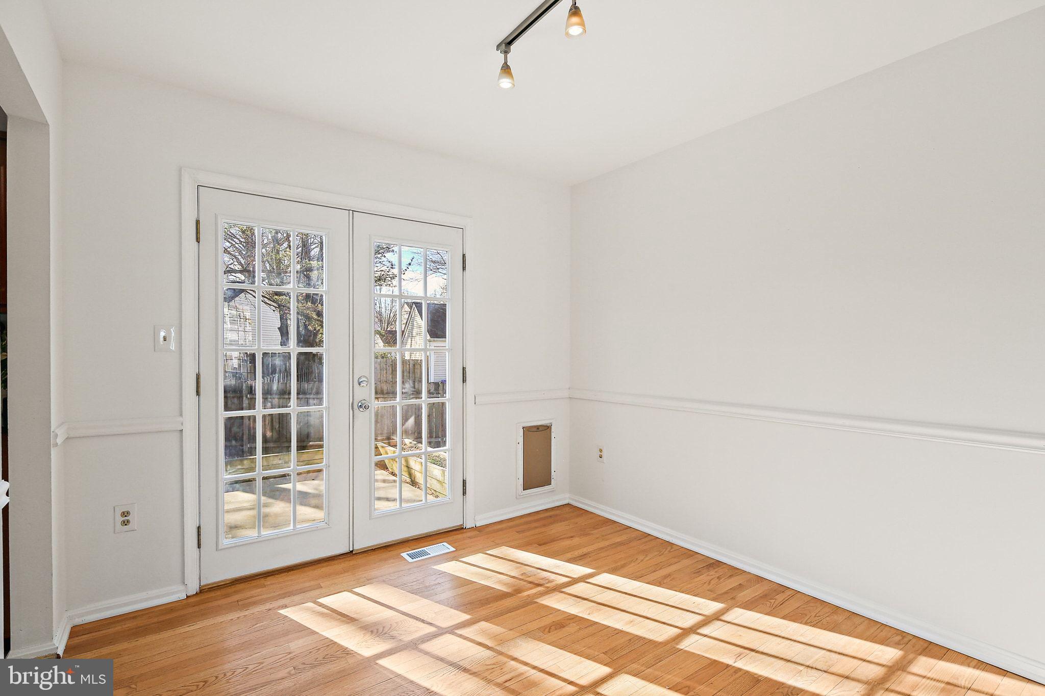 7510 Filbert Terrace Gaithersburg, MD 20879 - Photo 10 of 40 a view of an empty room with windows