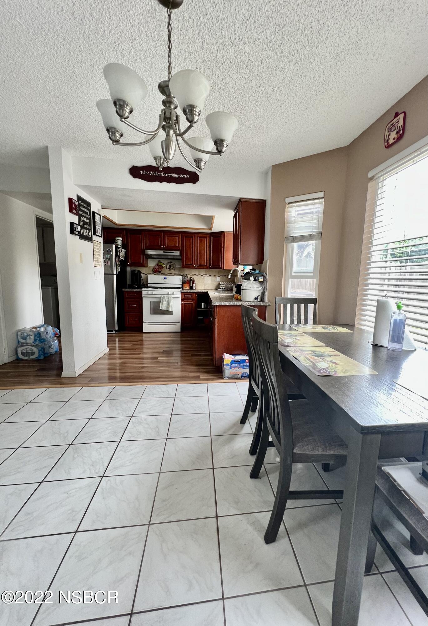 1233 Aster Lane Lompoc, CA 93436 - Photo 5 of 15 a view of a dining room with furniture
