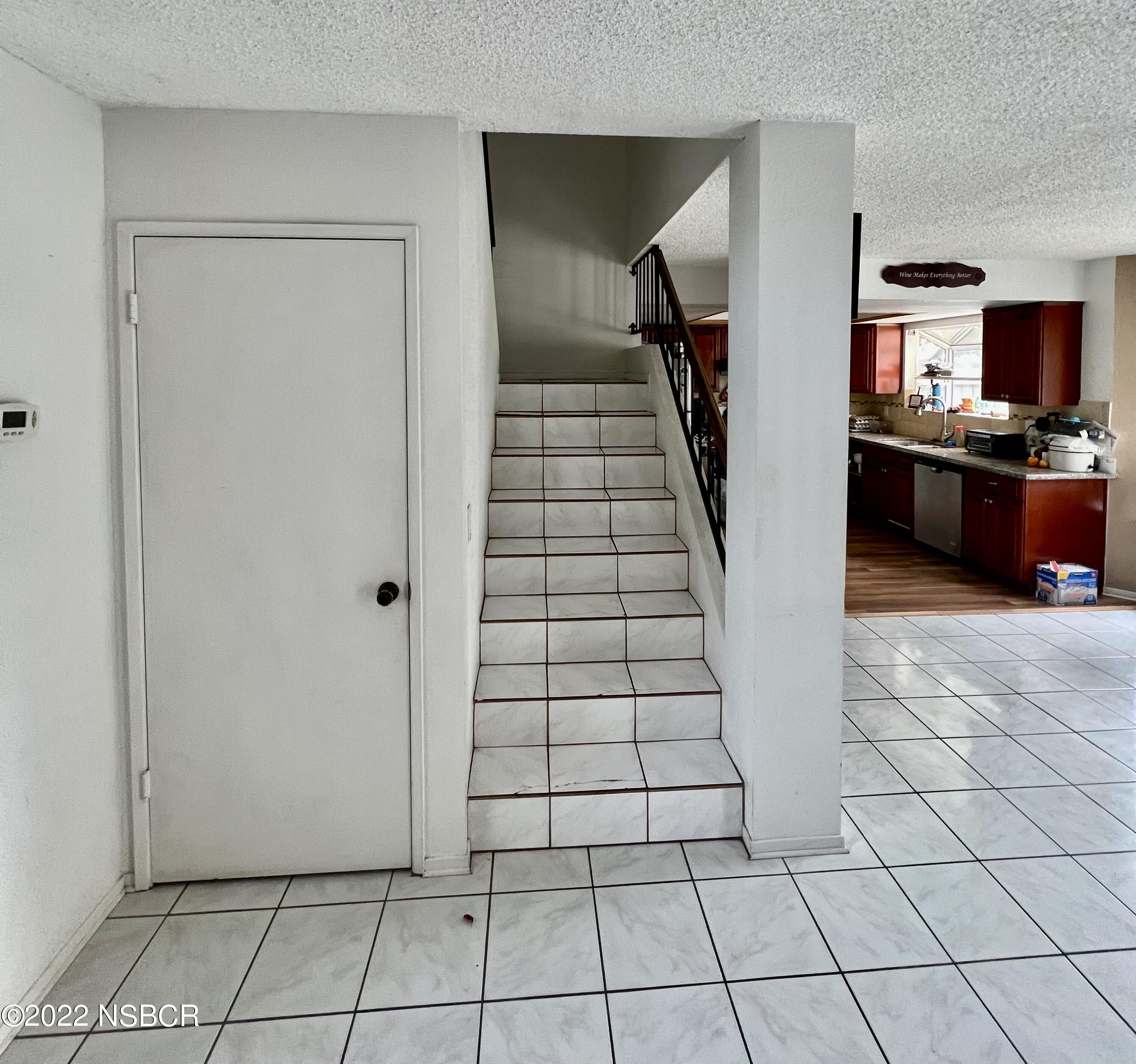 1233 Aster Lane Lompoc, CA 93436 - Photo 10 of 15 a view of a livingroom with shelves