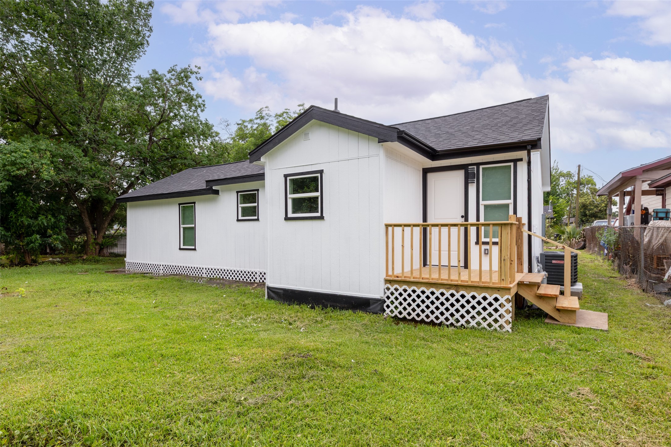 3225 Bostic Street Houston, TX 77093 - Photo 48 of 50 Step outside onto a brand-new back porch deck, ideal for entertaining