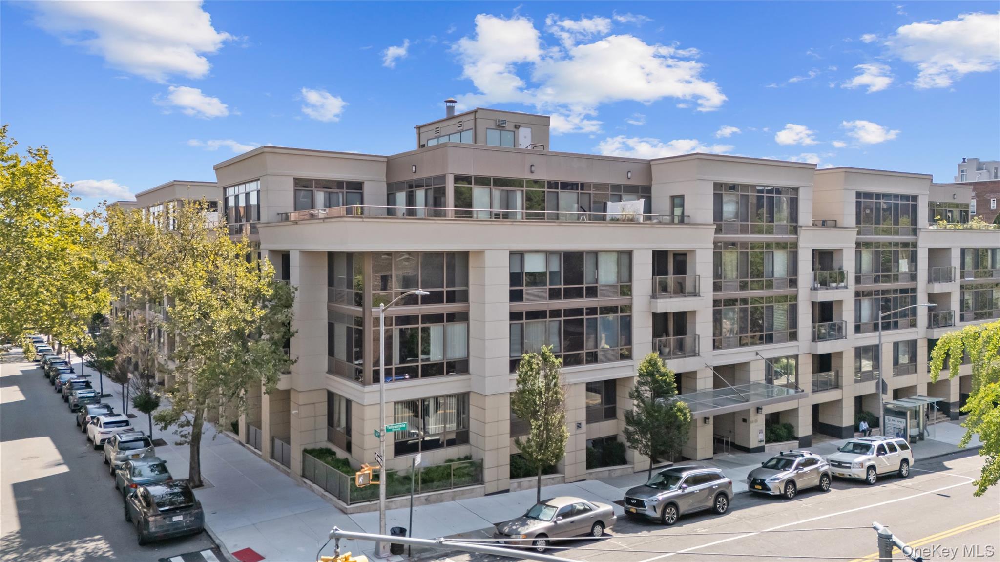 64-05 Yellowstone Boulevard, Unit PH 509 Queens, NY 11375 - Photo 24 of 28 a front view of a multi story building