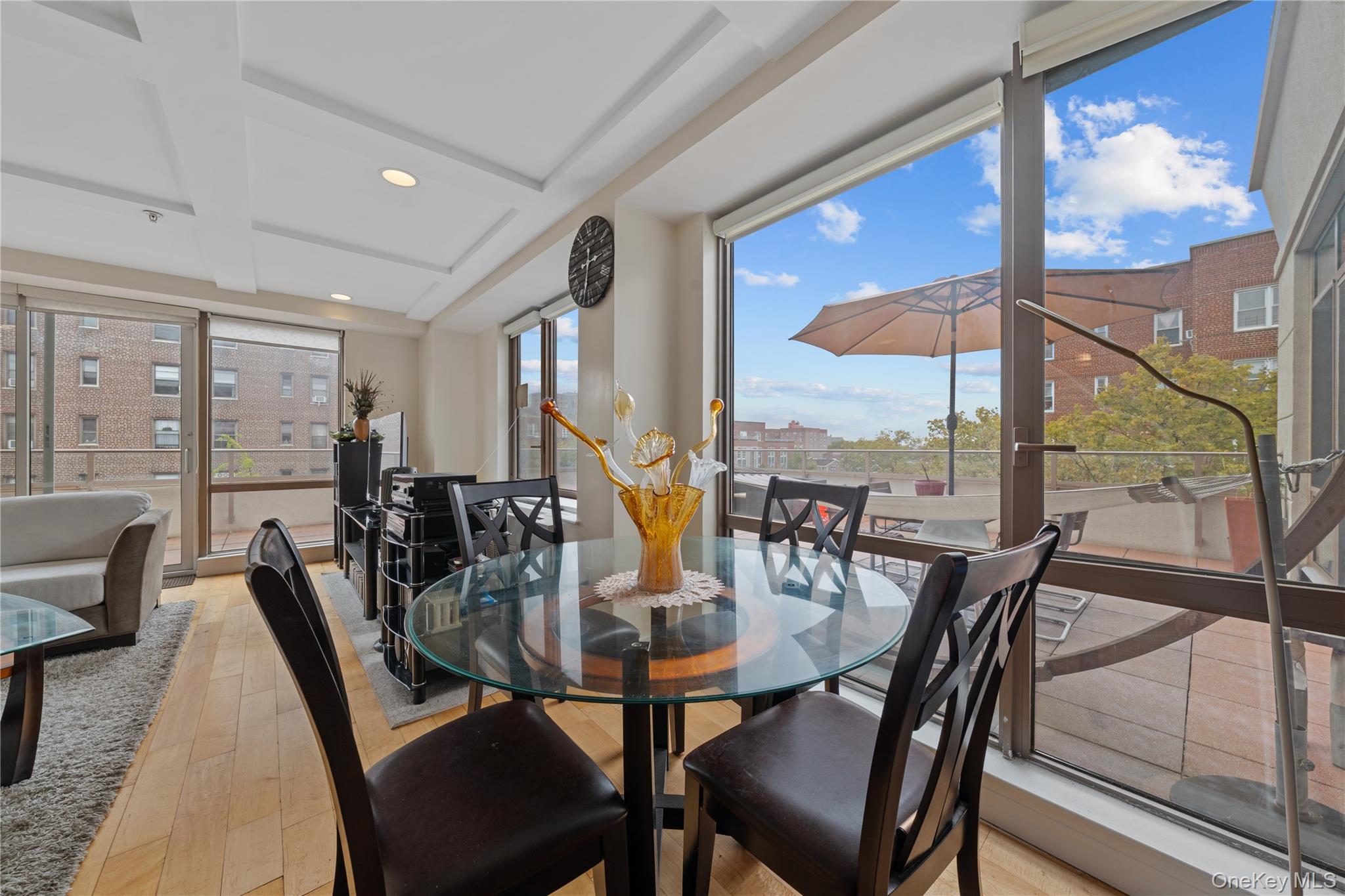 64-05 Yellowstone Boulevard, Unit PH 509 Queens, NY 11375 - Photo 6 of 28 a view of a dining room with furniture window and outside view