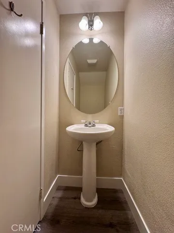 a white toilet sitting in a bathroom
