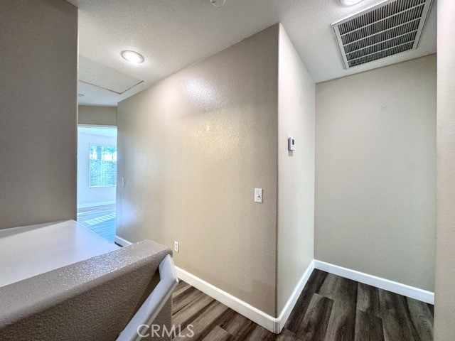 30455 Buccaneer Bay, Unit A Murrieta, CA 92563 - Photo 23 of 43 a bathroom with a sink and a mirror