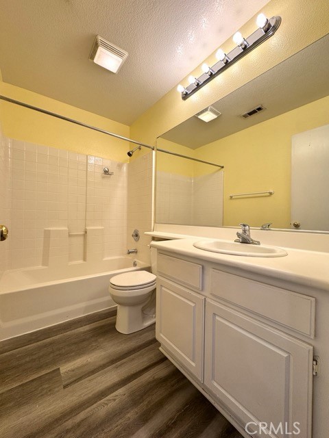 30455 Buccaneer Bay, Unit A Murrieta, CA 92563 - Photo 26 of 43 a bathroom with a double vanity sink and a mirror