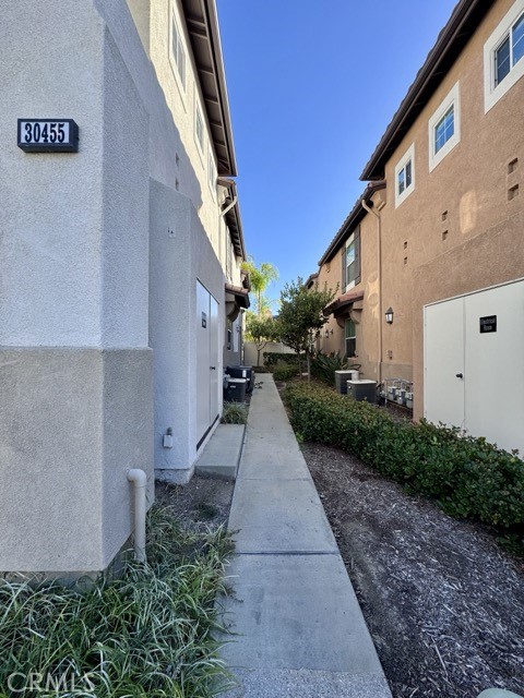 30455 Buccaneer Bay, Unit A Murrieta, CA 92563 - Photo 4 of 43 a view of a pathway along with yard